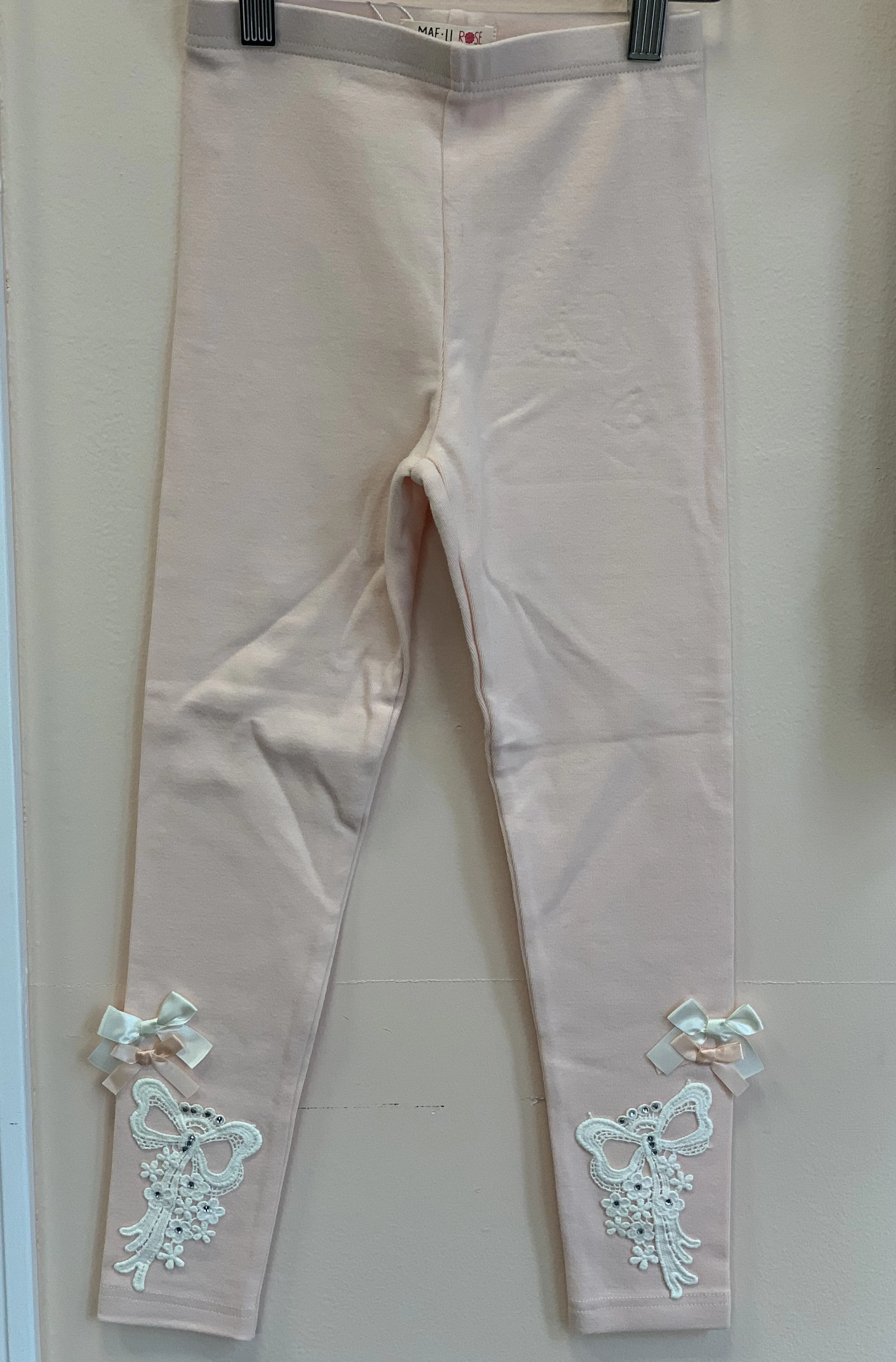 MaeLi Rose Bow Crochet Leggings in Peach